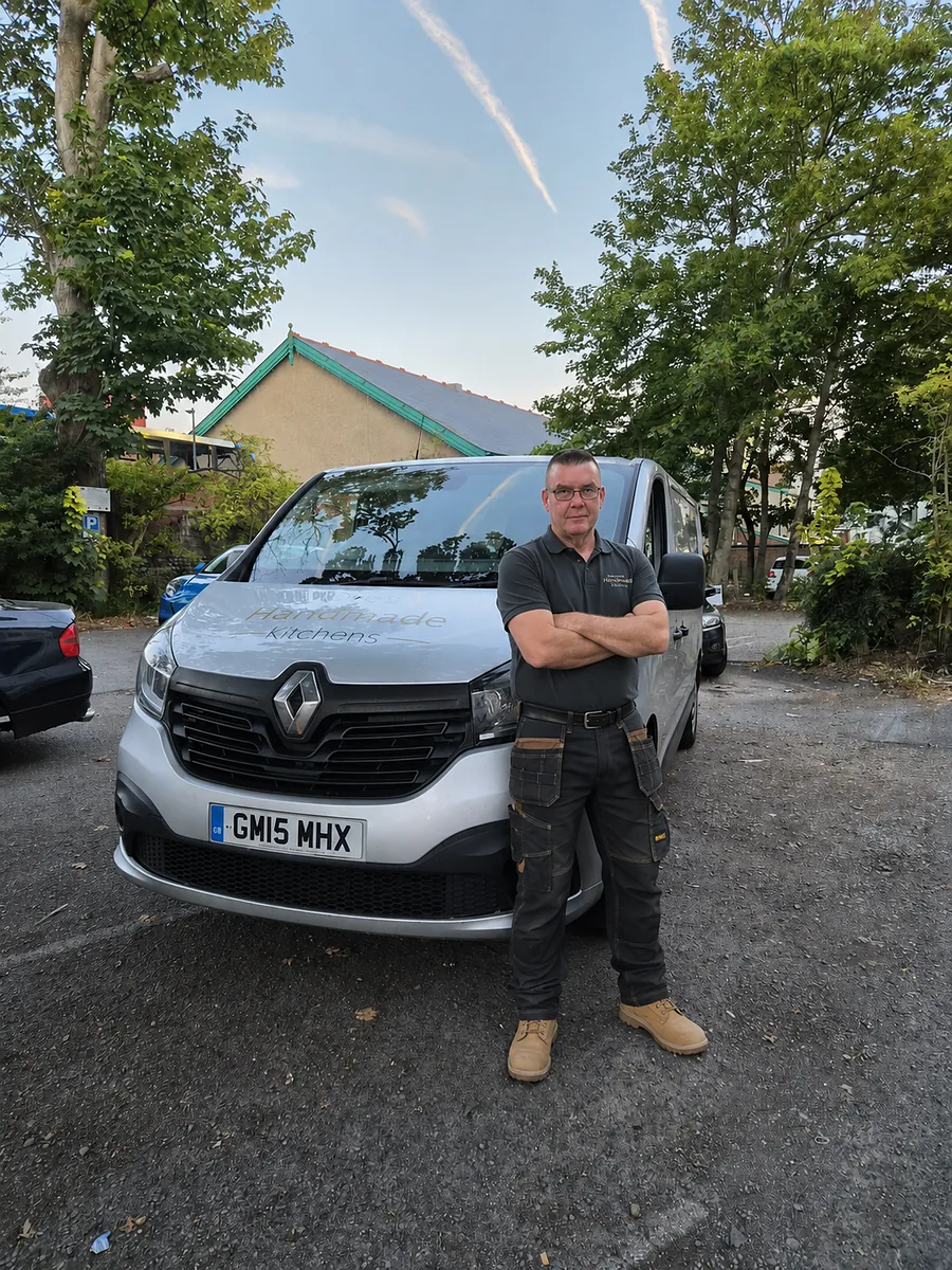 Ollie Feeley with the Ollie's Handmade Kitchens van