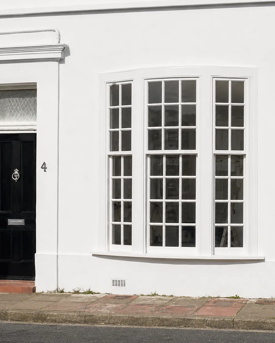 Painted front door and sash joinery on a Regency frontage