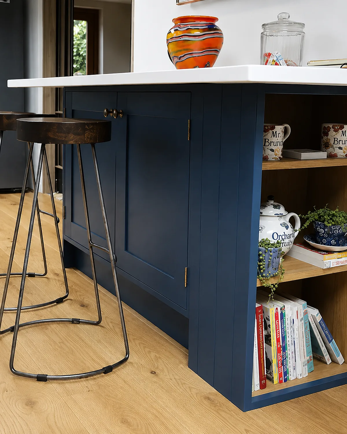 Navy island with open oak shelving